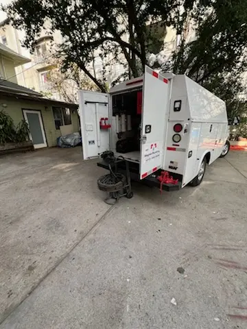 Magnet Plumbing service vehicle on-site for Grease Trap Cleaning in Bel Air